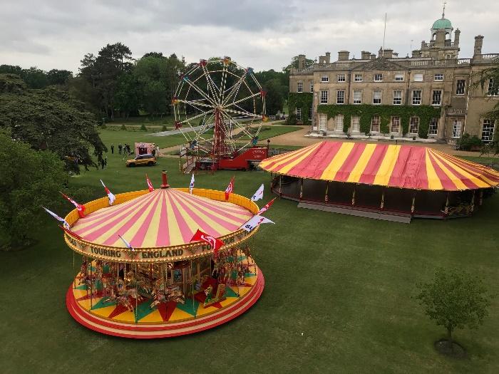 Outdoor funfair - a drone shot of a carousel
