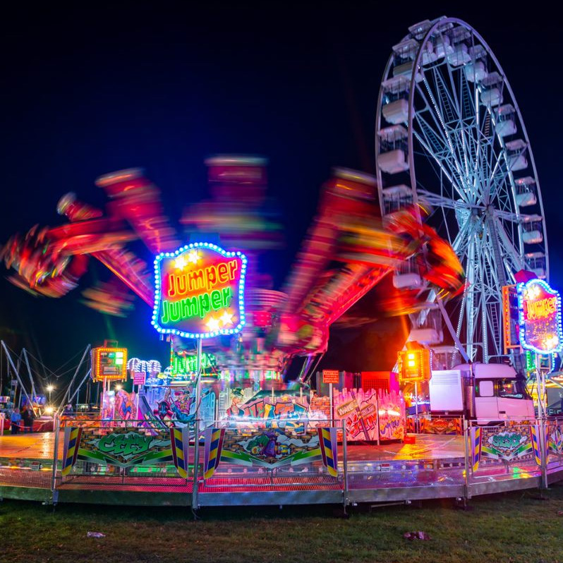 Outdoor funfair by night